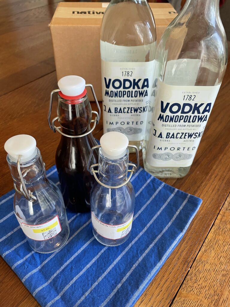 towel with vanilla bottles and vodka